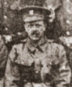 Newspaper photo of Edward Bradley in Army uniform.